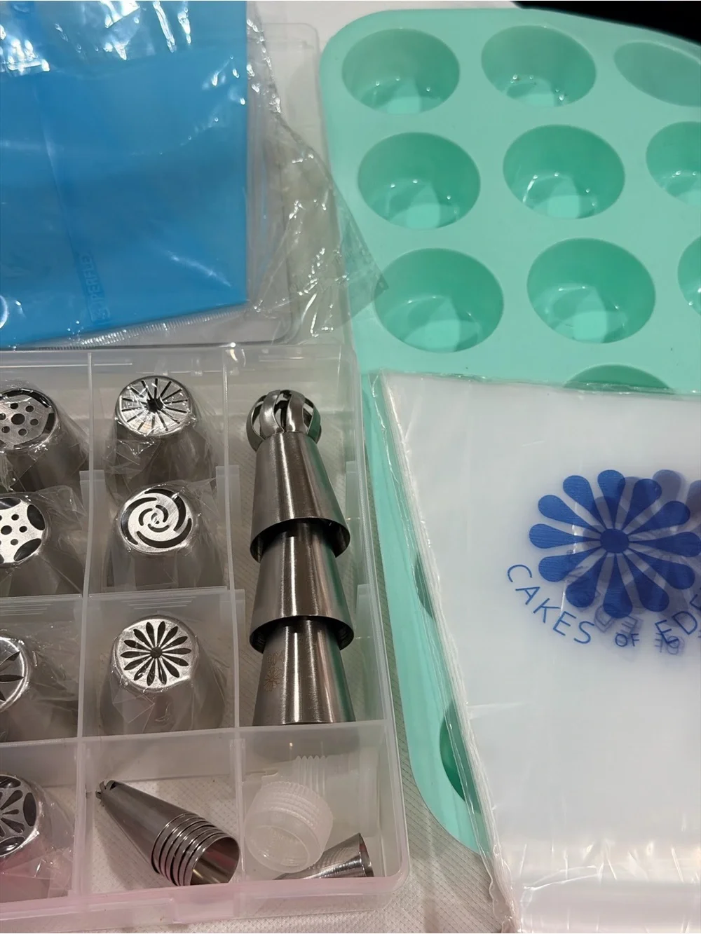 Cakes Of Eden (new) and a variety of (preowned) silicone molds